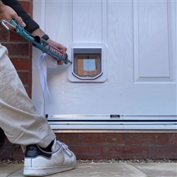 Pet Flap Installation in UPVC Doors - Watch an expert Ipswich cat-flap fitter in action